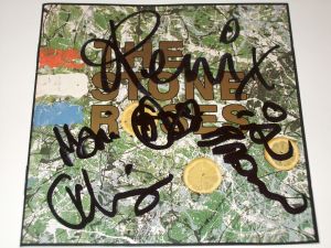 Stone Roses autograph debut album signed by Reni, Mani, Ian and John!