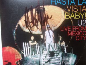 U2 autograph Propoganda CD signed by Adam and Edge