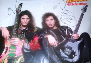 Steve Vai autograph and Joe Satriani sign an old Kerrang poster!
